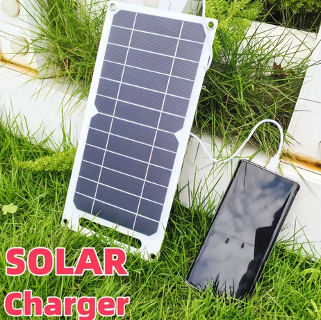 Outdoor use example of the 35W solar charger with a phone